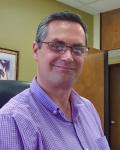 Headshot of Surplus Property Assistant Manager Mark Engelman
