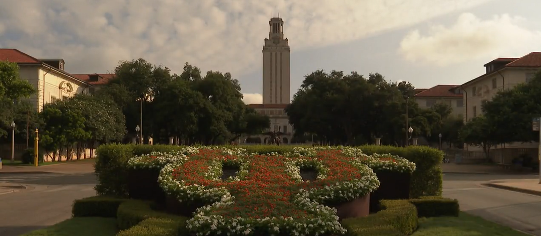 UT in landscaping with view of Tower