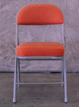 Padded folding orange chair
