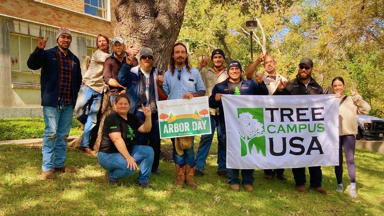 Hero image of the Urban Forestry Team receiving Tree Campus USA Recognition